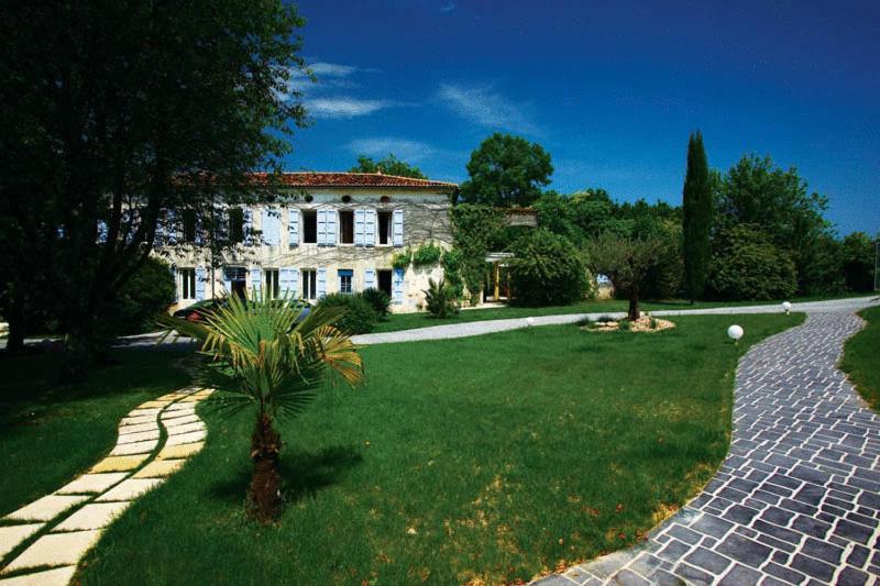 L'Hedoniste Hotel Cherac Bagian luar foto